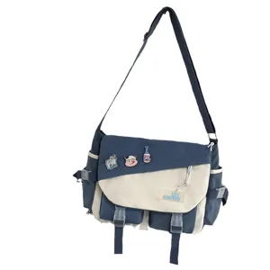 Japanese style canvas messenger bag for men and women, color block crossbody bag with cute pins.