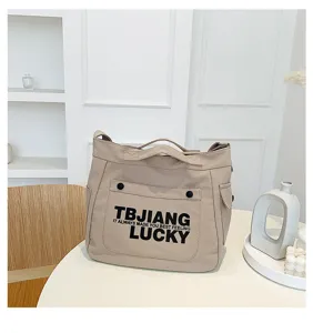 Beige canvas tote bag large capacity shoulder crossbody casual student bag stylish.