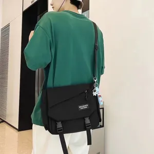 Casual black canvas messenger bag for students and daily commute, crossbody shoulder bag.