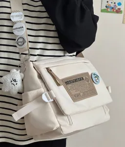 Canvas messenger bag detail view, casual retro style, large capacity, perfect for daily use.