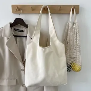 Casual beige canvas tote bag, simple large capacity shoulder bag for daily use.