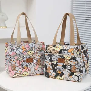 Thickened canvas lunch bag with cute cat print, portable tote handbag for daily work or school use.