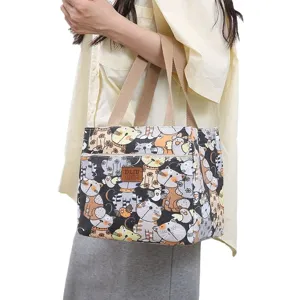 Women's canvas lunch bag with cute cartoon cat print, thickened portable handbag for work.