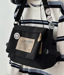 Black canvas messenger bag, Japanese retro style, large capacity, casual shoulder bag.