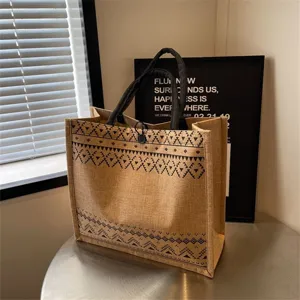 Stylish jute tote bag with ethnic geometric pattern, casual canvas handbag for women commute.