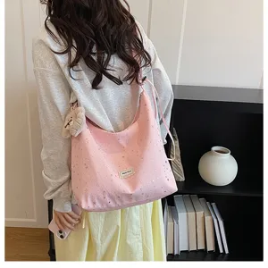 Chic pink star print slouchy tote bag for women, large capacity casual shoulder bag daily use.