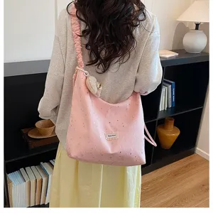 Pink star print slouchy tote bag, large capacity soft fabric shoulder bag with cute charm.