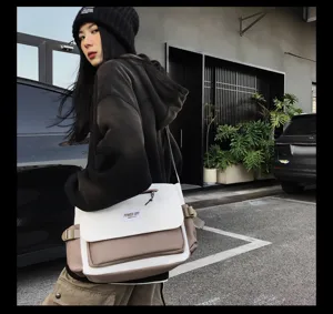 Casual nylon messenger bag with large capacity, stylish two-tone shoulder bag for daily use.