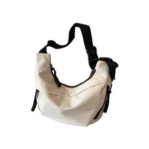 Stylish white nylon crossbody shoulder bag for women, large capacity casual dumpling bag.