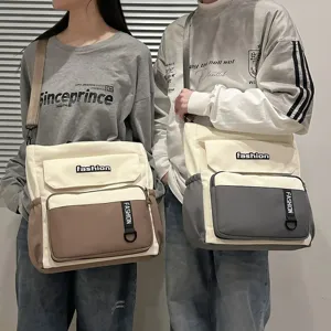 Trendy large capacity canvas crossbody shoulder bag for student casual daily use.