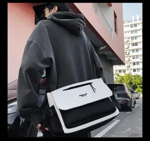 Stylish black and white nylon messenger bag, large capacity casual crossbody bag for daily use.