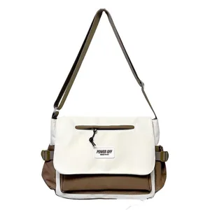 Stylish nylon messenger bag with white flap, large capacity shoulder bag for student daily use.