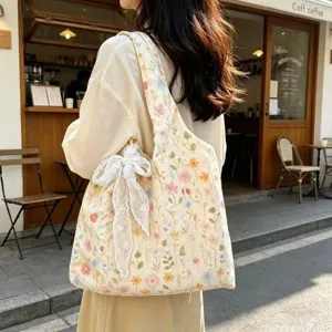 Floral embroidered canvas shoulder bag with lace bow, casual literary style large capacity tote.