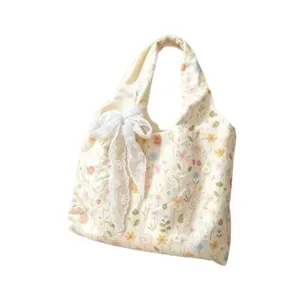 Chic floral embroidered canvas tote bag featuring a cute lace bow, casual shoulder bag.