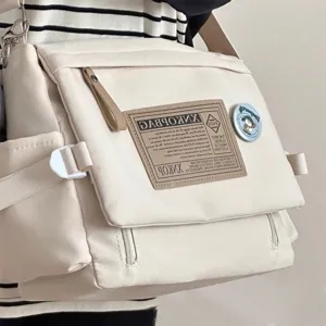 Casual large capacity canvas crossbody messenger bag for students commuter vintage style.