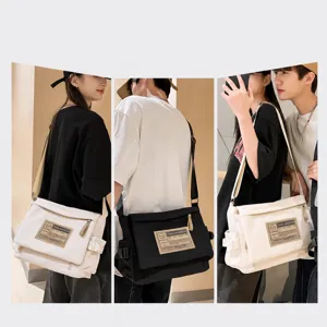 Casual large capacity canvas messenger bag for students and commuters, vintage retro style.
