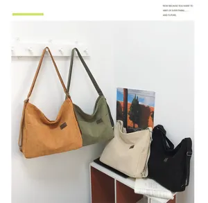 Sac à bandoulière en velours côtelé grande capacité, fourre-tout tendance et pratique école.
