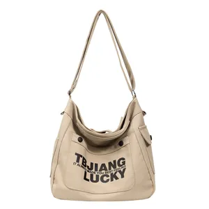 Casual beige canvas shoulder bag with large capacity, stylish messenger bag for daily use.