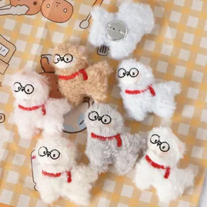 Cute plush alpaca brooch pin with glasses and red scarf, soft stuffed cartoon bag pendant accessory.