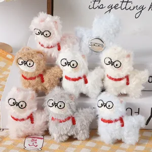 Cute plush alpaca brooch with glasses and red scarf, fluffy stuffed doll bag pendant accessory.