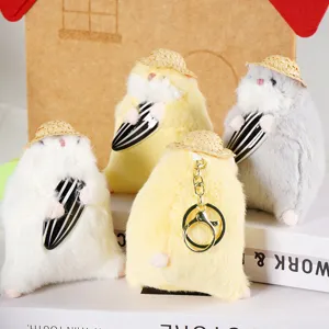 Portachiavi peluche criceto carino con semi vista dettagliata e morbido design soffice.