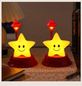Vista dettagliata della simpatica luce notturna a stella con LED e decorazione accogliente.