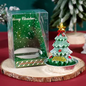 Candela profumata albero di Natale con scatola regalo, decorazione festiva e regalo natalizio.