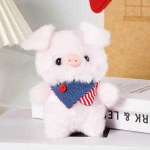 Cute pink plush pig stuffed animal toy with adorable scarf, soft mini doll pendant for bags.