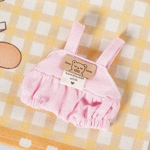 Vista dettagliata della salopetta rosa in waffle per vestiti da bambola di peluche 10-14cm.