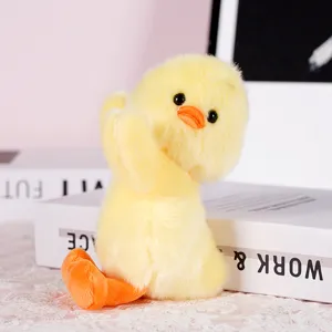 Cute yellow duck plush doll detail, soft stuffed animal toy for desktop wrist rest