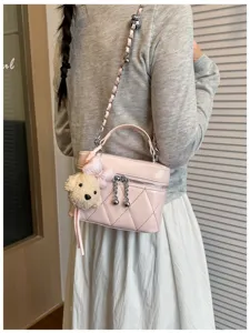 Chic pink quilted chain crossbody bag with cute bear pendant, stylish women small square bag.