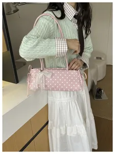 Borsa a tracolla baguette a pois rosa con fiocco di perle in pizzo, stile dolce.