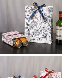 Sac cadeau floral rétro avec ruban élégant, carton blanc de qualité pour fêtes.