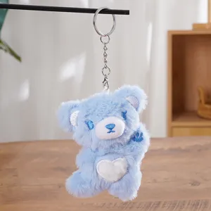 Blue plush bear keychain cute heart pendant fluffy bag accessory soft doll decoration.
