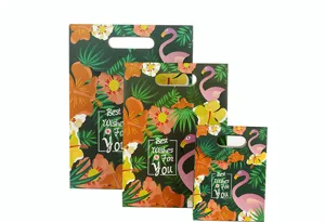 Set van tropische flamingo cadeau papieren zakjes met handvatten voor feestverpakking.