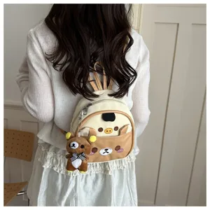 Cute cartoon bear backpack for women and students, stylish casual daypack with pendant.
