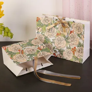 Ins stijl champagne roos geschenkzak met lint, elegante papier verpakking tas voor kleding en feest.