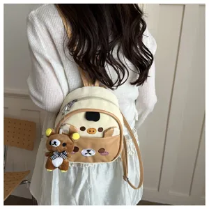 Cute cartoon bear mini backpack detail, perfect for students and stylish daily outdoor commuting.