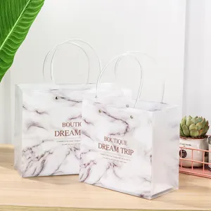 Transparante marmeren plastic cadeautas shopping draagtas met doorzichtige handvatten.