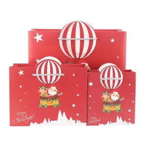 Kerstcadeau papieren tassen set met schattige kerstman en leuk heteluchtballon ontwerp