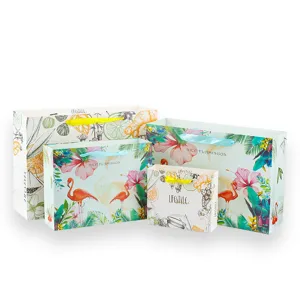 Set of 4 flamingo fruit print paper gift bags with ribbon handles for shopping and party.