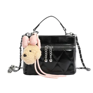 Chic black quilted leather crossbody handbag with cute puppy plush charm and chain strap.