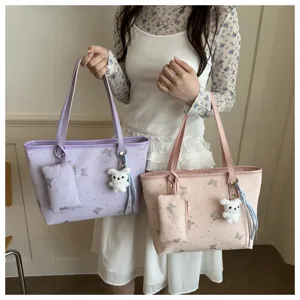 Stylish women tote shoulder bag with butterfly print, small pouch and cute rabbit charm.