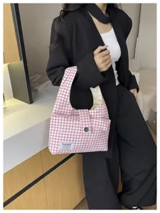 Detailed view of women's large capacity plaid shoulder handbag, fashionable and casual.