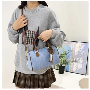 Vintage denim boston handbag for women, casual shoulder crossbody bag for daily commute.