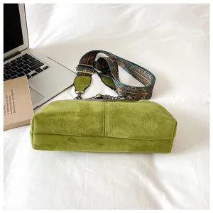 Retro green suede shoulder crossbody bag with ethnic strap and chain detail, stylish daily use.