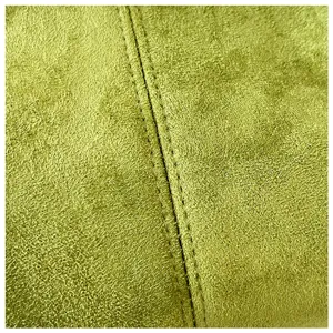 Green suede texture detail close-up showcasing neat double-line stitching craftsmanship.