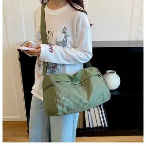 Casual green grid travel duffel bag, lightweight shoulder gym bag for women daily use.
