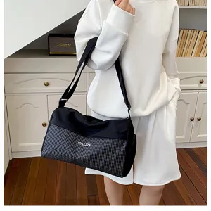 Casual travel duffel bag with chic grid pattern and comfortable shoulder strap for daily use