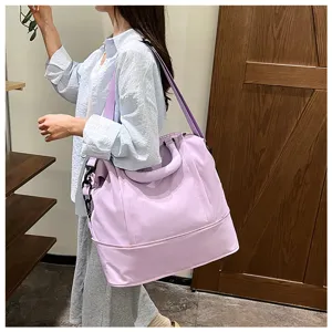 Large capacity travel bag for women, lightweight waterproof duffel bag for short trips and daily use.